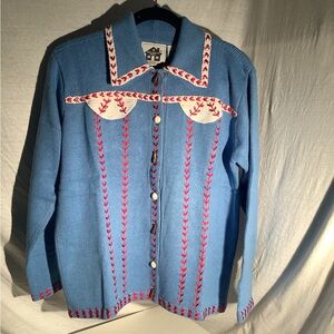 Storybook knit sweater titled “American Game”